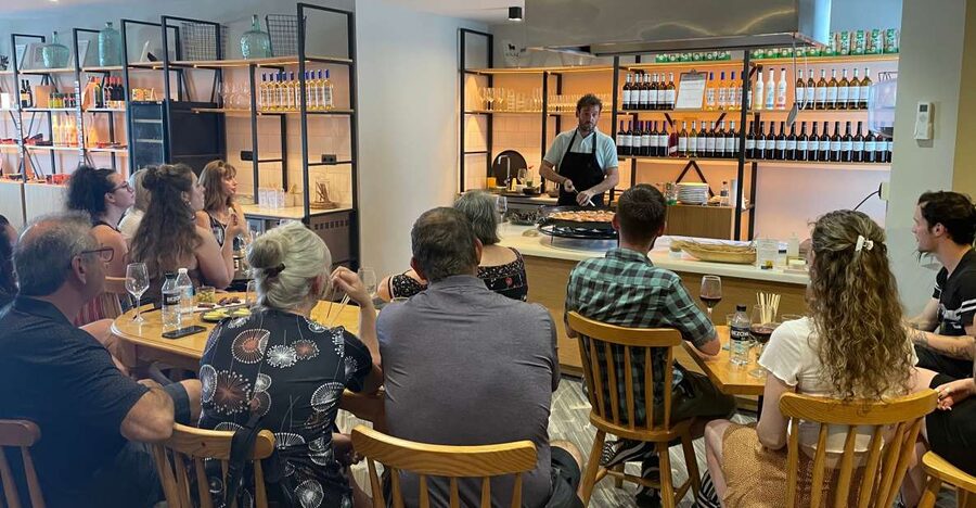Seville: Paella-Cooking Experience with Sangria & Full Meal - What happens during the 2.5-hour presentation