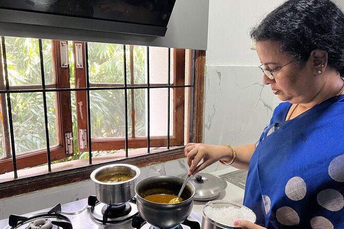 South Indian Vegetarian Cooking Class in Chennai with Meena - Learning the difference between curry, rasam, and vegetable dishes