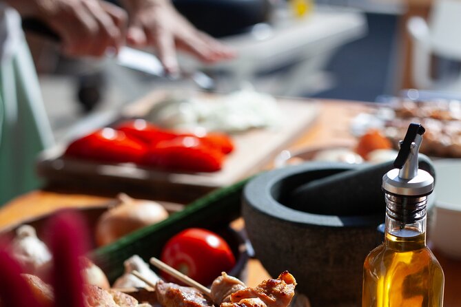 Souvlaki Cooking Class with Locals – Transfer Included - Cooking pork and chicken souvlaki
