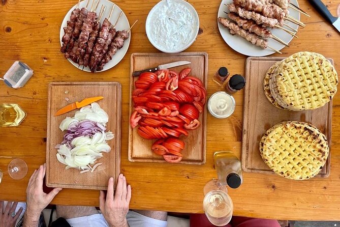 Souvlaki Cooking Class with Locals – Transfer Included - Sitting down for lunch or dinner