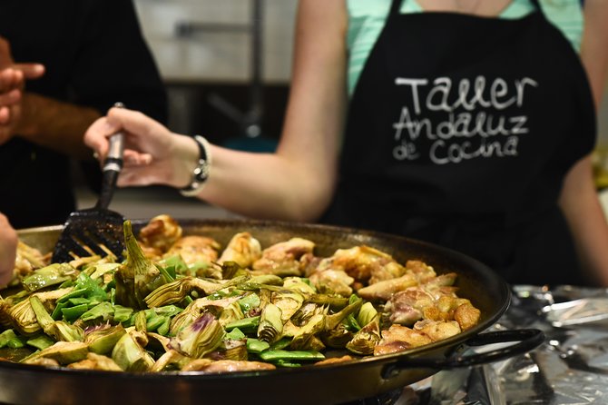 Spanish Cooking Class & Triana Market Tour in Sevilla - Cooking salmorejo, chickpeas, and paella