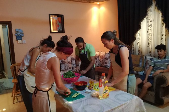 Suhaila (connecting through cooking) - Sitting on the floor for a traditional meal