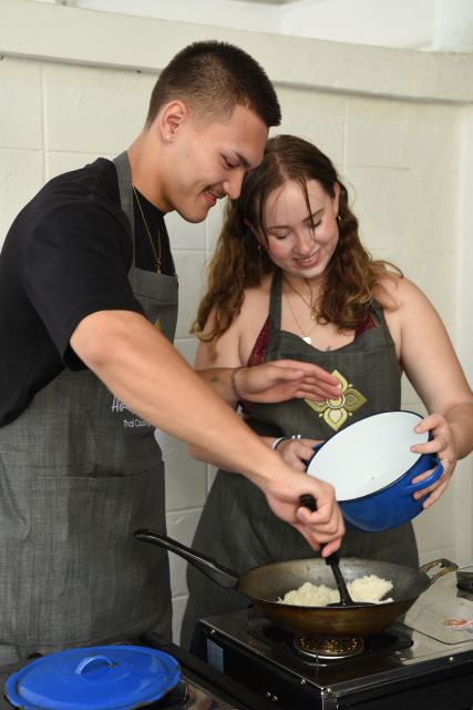 Sukhumvit: Hands-on Thai Cooking Class & Market Tour in BKK - A clean kitchen and a generous meal