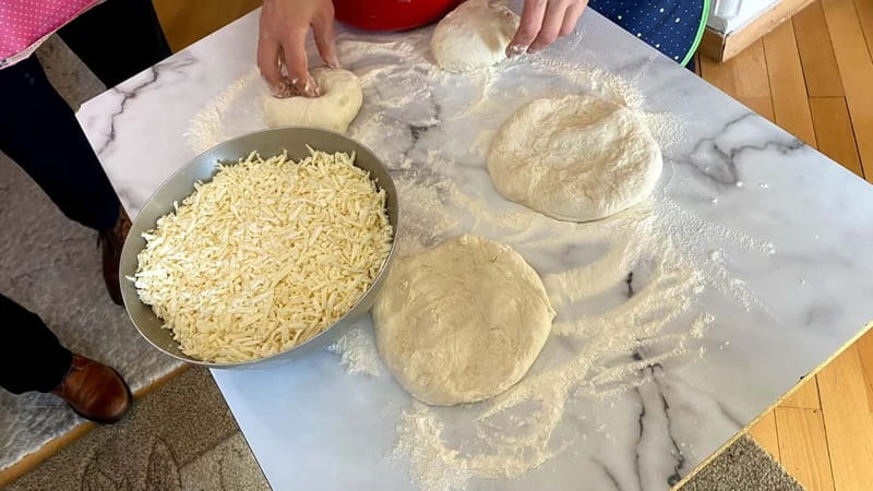 Tbilisi: Cooking Class with a Local Family - Mchadi, eggplant, salad, and the rest of the table