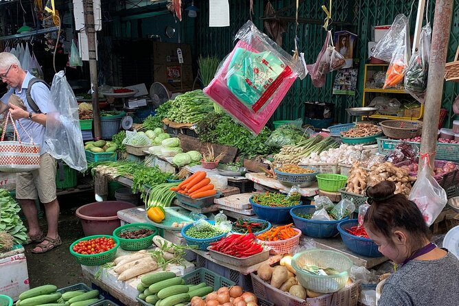 Thai Cooking Class with Market Visit by Maliwan - Riding a tuk-tuk to a working local market