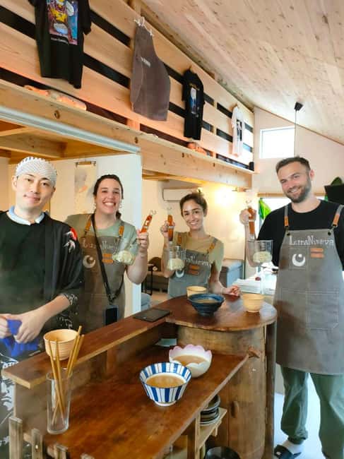 Tokyo: Real Ramen & Dumpling Cooking with Master Chef - Seasoning chashu and preparing the final bowl