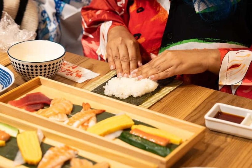 Tokyo: Sushi Making Class in a Happi Coat near a Famous Spot - Small groups, shared tables, and private-feeling sessions