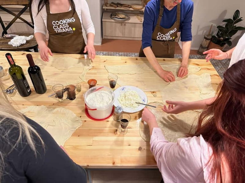 Traditional Albanian Cooking Class in Tirana & Raki Tasting - Preparing village chicken with pershesh