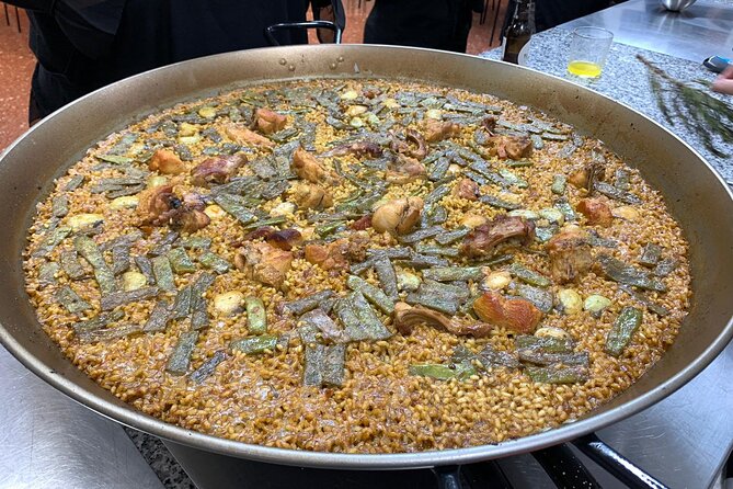 Valencian Paella Cooking Class, Tapas & Sangria - Evening - What the Guides Add to the Evening