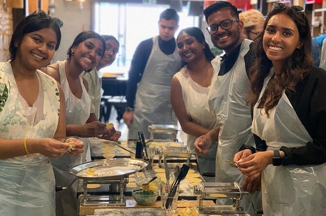 Verona: Pasta and Tiramisu Cooking Class With Free Flowing Wine - Making pasta beside Verona’s Arena